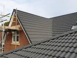 Completed new interlocking tiled roof on a residential property in Aylesbury, Buckinghamshire