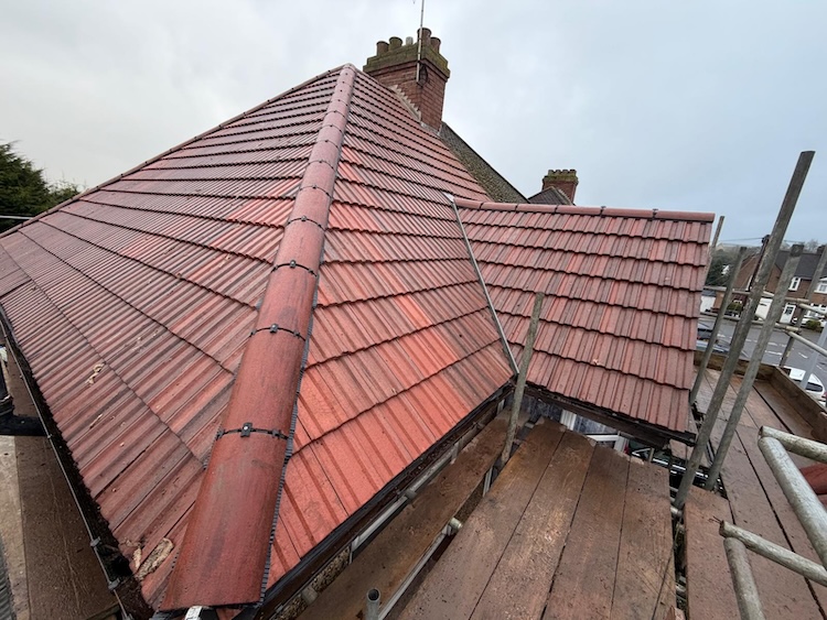 Completed new tiled roof in Luton viewed from the scaffold