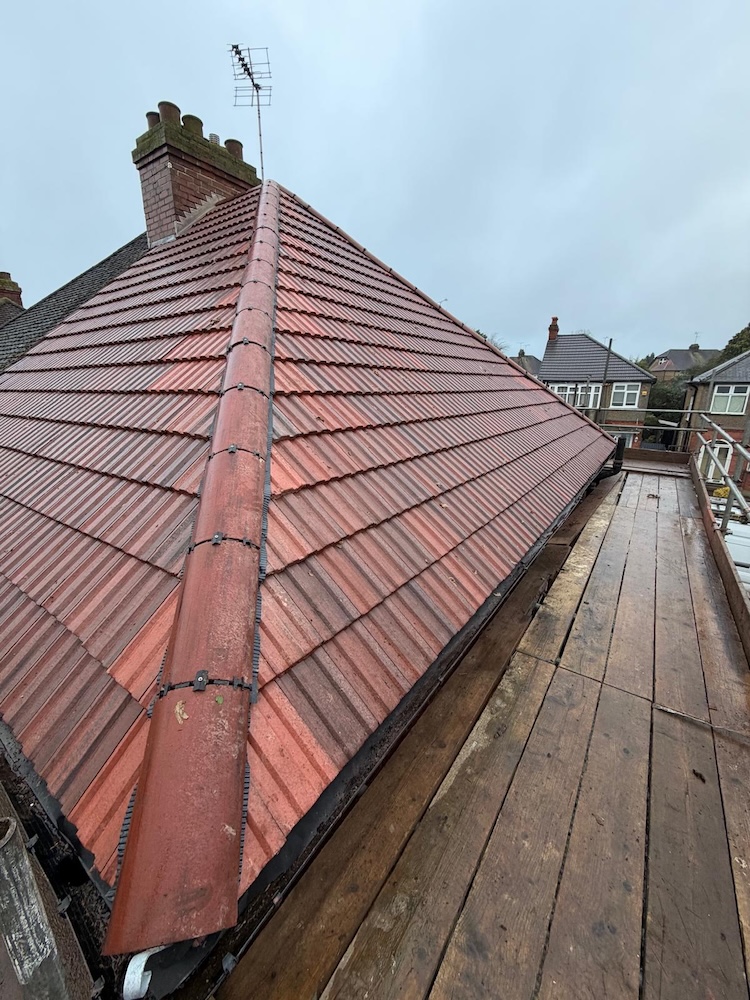 New concrete interlocking roof tiles installed in Luton