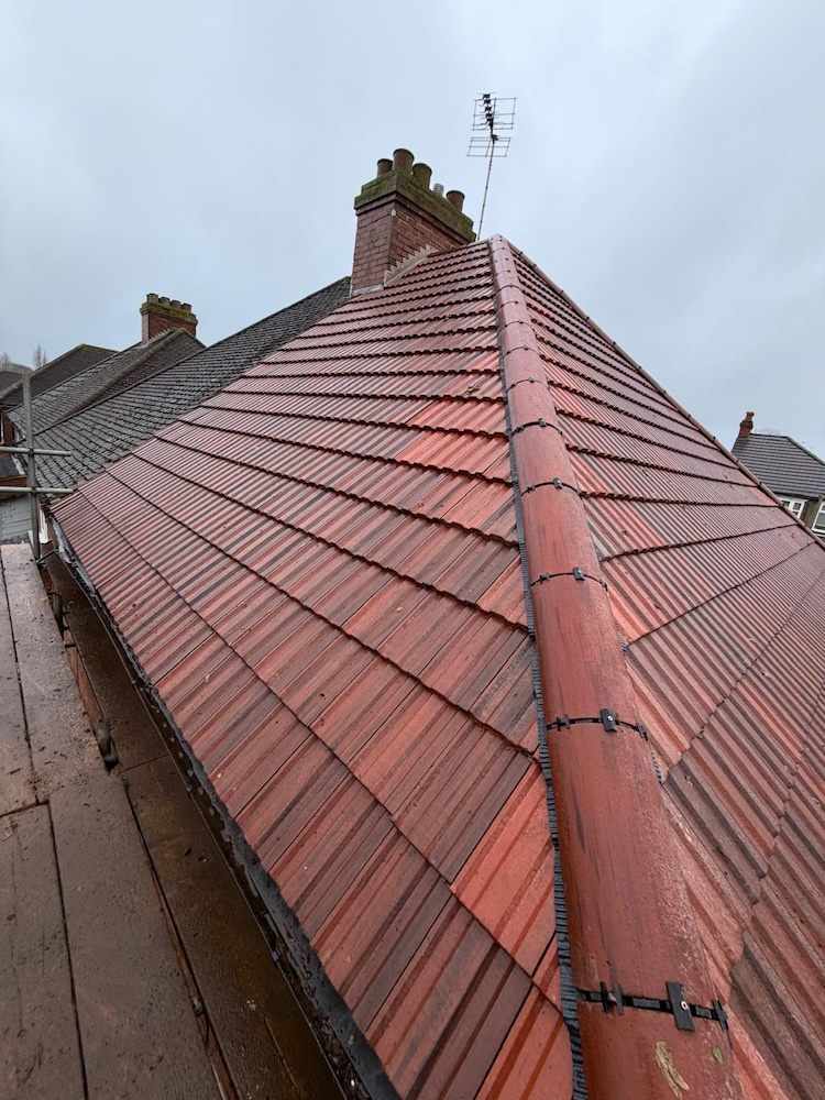 Finished tiled roof covering on the Luton property