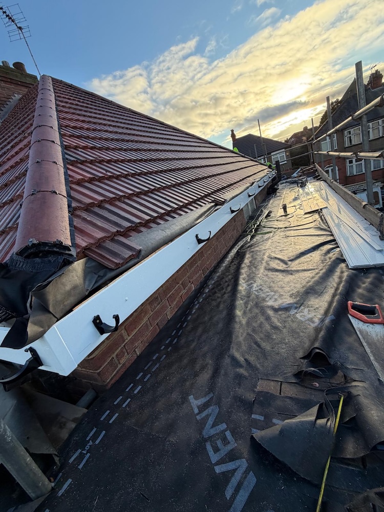 Completed new tiled roof with ridge tiles and chimney in Buckinghamshire