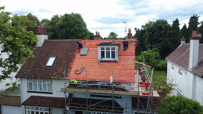 Re-roof in progress on the front elevation in Amersham